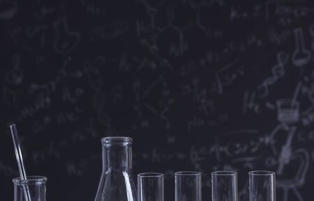 Glass laboratory chemical test tubes with liquid for analytical , medical, pharmaceutical and scientific research concept.の写真素材