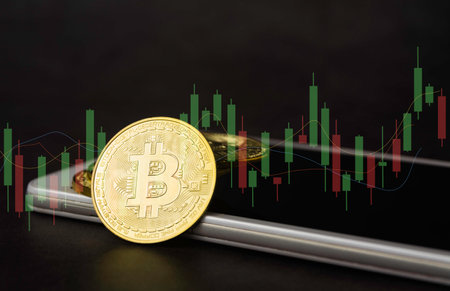 Saving money concept with Bitcoin and smart phone. financial and accounting concept.