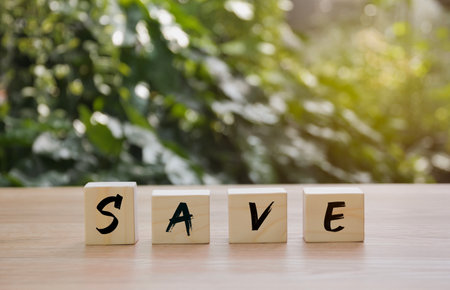 English alphabet Save made of square wooden tiles with the English alphabet.の写真素材