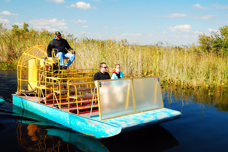 A Fan Boat Prepares to take Visitors on a Tour of the Florida Evergladesのeditorial素材