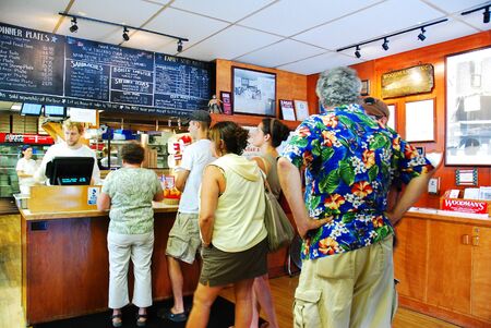 Folks line up for dinner on a summer evening at Woodmans Of Essex, Massachusetts