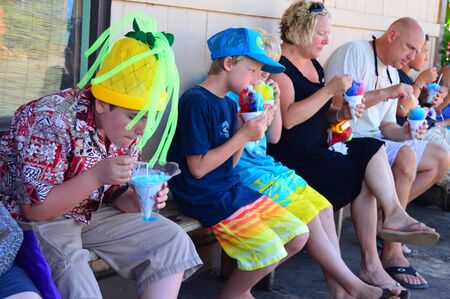 Families enjoy a shave ice treat at Matsumoto's General Store in Hawaiiのeditorial素材