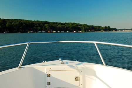 A boaters perspective of a calm lakeの写真素材