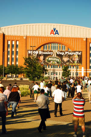 A Crowd Heads Towards the American Airlines Arena in Dallas Texasのeditorial素材