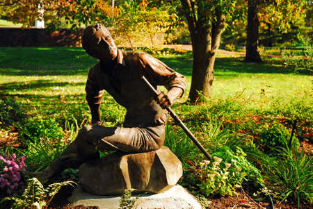 A Statue of Songwriter and Composer Stephen Foster in My Ol Kentucky Home State Park, at the site that inspired the songのeditorial素材