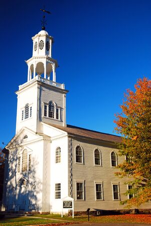 The First Congregational Church in Bennington Vermont is set amongst the autumn foliageの写真素材