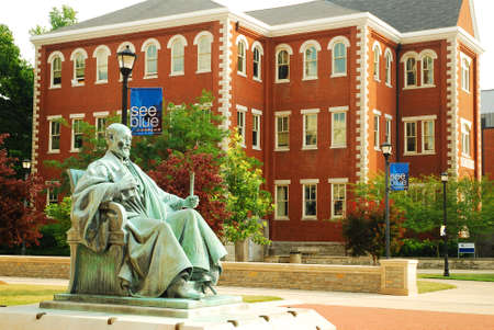 A sculpture of James Kennedy, the first President of the University of Kentucky, sits in the main quad of the schoolのeditorial素材