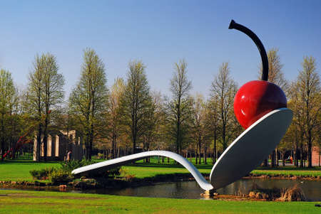 Claes Oldenburg's Spoonbridge and Cherry is a popular attraction at the Walker Art Center in Minneapolisのeditorial素材