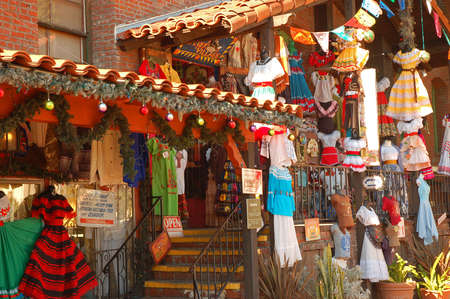 Traditional Mexican styled clothes are for sale at an El Pueblo Market in Los Angelesのeditorial素材