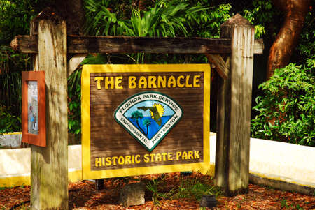 A sign welcomes visitors to the Barnacle, an historic site near Key Biscayne, Floridaのeditorial素材
