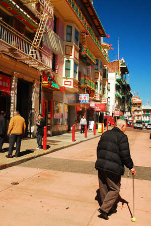 An adult man walks along the Painted Balconies in Chinatown San Franciscoのeditorial素材