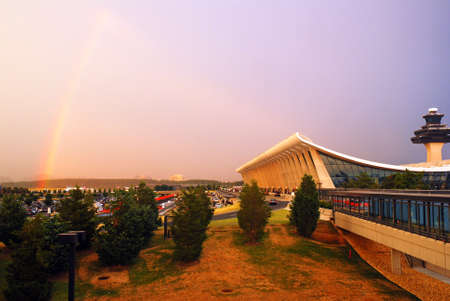 A Rainbow forms after a storm clears the area around Dulles International Airportのeditorial素材