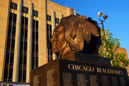 The hockey Blackhawk alumni are honored at a sculpture outside of the United Center, their home in Chicagoのeditorial素材
