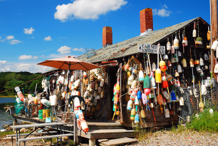 A lobster shack in Maine is decorated with numerous lobster buoysのeditorial素材