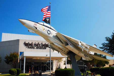 A Grumman F14 stands in front of the Museum of Naval Aviation in Pensacola, Floridaのeditorial素材