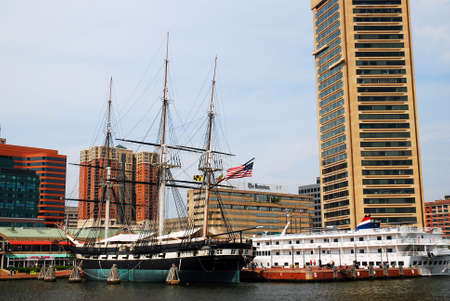 The schooner USS Constellation sits in the center of Inner Harbor, Baltimore, Marylandのeditorial素材