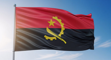A vivid portrayal of Angola's national flag waving proudly. Witness the flag's powerful symbolism against a bright blue sky. Captures the essence of Angola's national pride. Explore the significance of Angola's national colors displayed across the flag in detailed view. A symbol of national identity set against serene blue skies.の素材