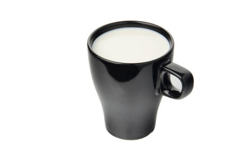A Sad Milk in a tall black cupの写真素材