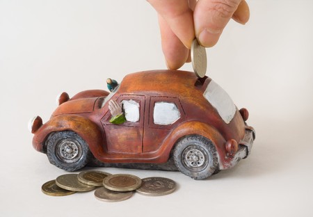 A close-uo of the coin box as toy car.の写真素材