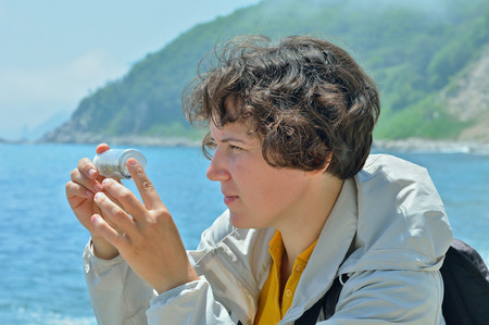 The young woman entomologist at sea.の写真素材
