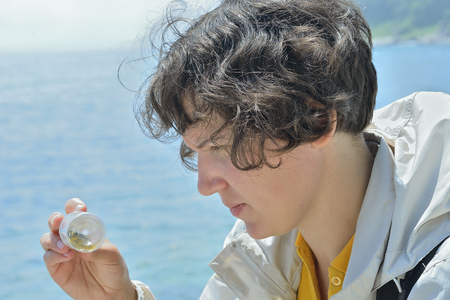 The young woman entomologist at sea.の写真素材