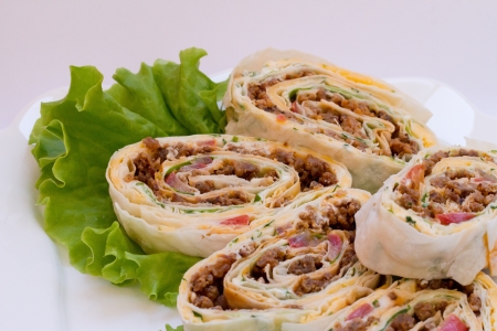 Meet rolls with salad on the plateの写真素材