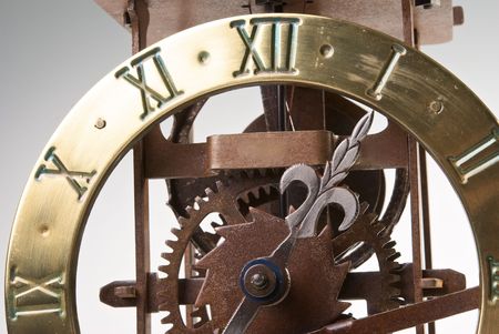 Antique looking clock dial showing time about twelveの写真素材