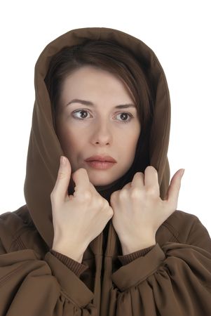 Sad young woman holding her hoodの写真素材