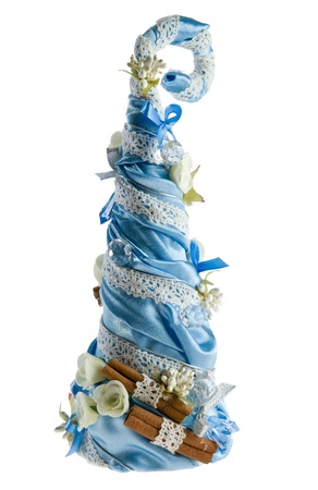 Group of artificial hand maded christmas trees isolated on white, decorated with flowers ornaments and ribbonsの写真素材