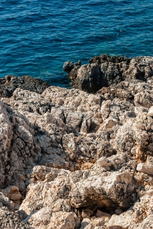 Rocky sea shore backgroundの写真素材