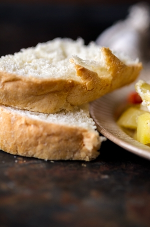 Macro of fresh bread sliced on a dark backgroundの写真素材