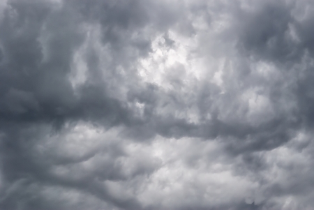 Background of storm clouds before a thunder-stormの写真素材