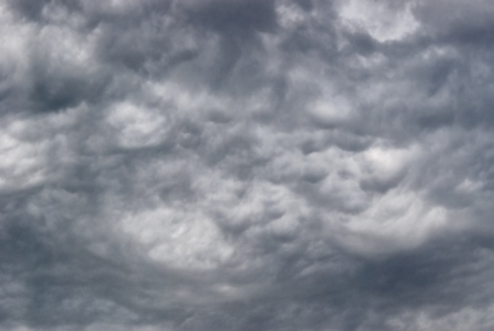 Background of storm clouds before a thunder-stormの写真素材