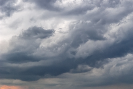Background of storm clouds before a thunder-stormの写真素材