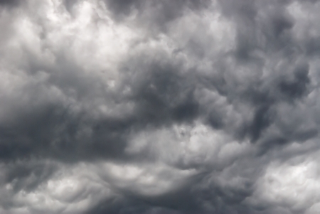 Background of storm clouds before a thunder-stormの写真素材