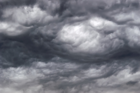 Background of storm clouds before a thunder-stormの写真素材