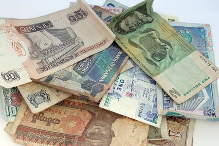 Business concept - with many coins of different countries