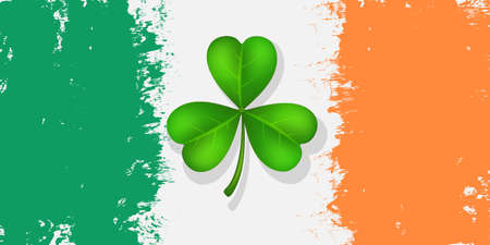 Saint Patrick's Day. Clover shamrock leaves on Ireland flag background of grunge texture for happy St. Patricks Day. Ideal for greeting card, poster and web template. Vector illustrationのイラスト素材