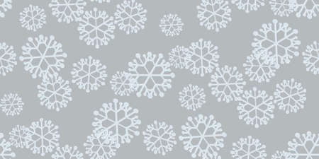 Beautiful seamless Christmas background with various complex big and small snowflakes on gray....