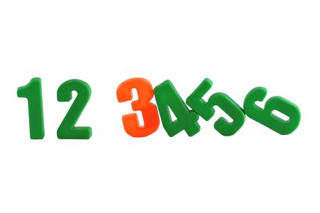 Green and red plastic figures ranked on a white background
