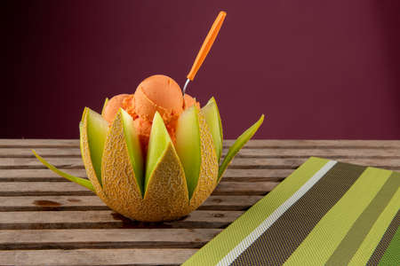 ice cream served in melonの写真素材