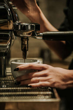 espresso machine pouring coffeeの写真素材
