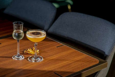 two glasses of wine and a glass of wineの写真素材