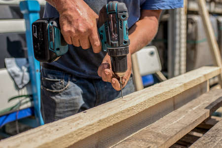 worker works with self-tappingの写真素材