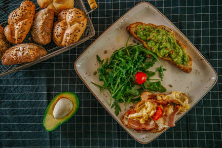 bruschetta with vegetables and avocadoの写真素材