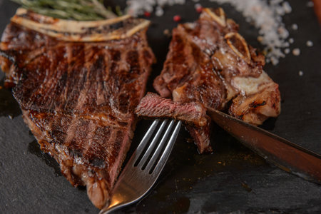 grilled steak on a grillの写真素材