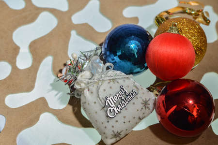 Christmas and New Year's toys on the background of a camouflage fabricの写真素材
