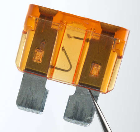 Overburned fuse. Broken by short circuit.の写真素材