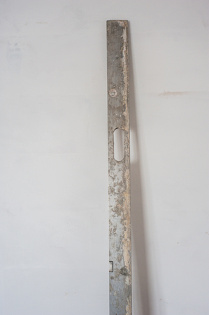 Construction level on glass on a white background. Copy space.