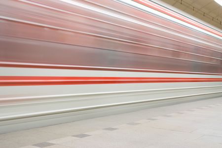 An abstract train in the subway station. Blured in motionの写真素材